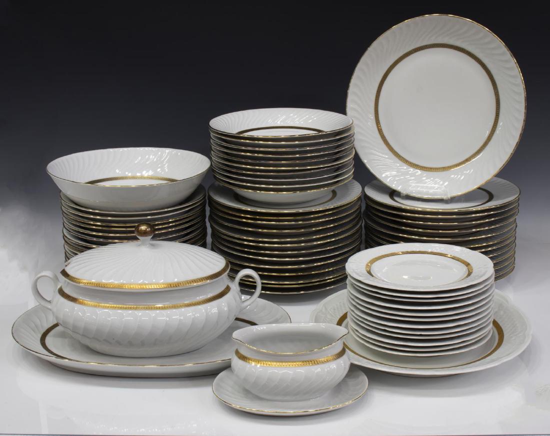 (67) GILT PORCELAIN ASSEMBLED DINNER SERVICE: (lot of 67) Porcelain dinner service, assembled, including similarly styled gilt patterns, one from Gareis Waldsassen Bavaria, including: (25) plates, some gilt loss, 9.5"diam, (24) bowls, 9"diam, (1)