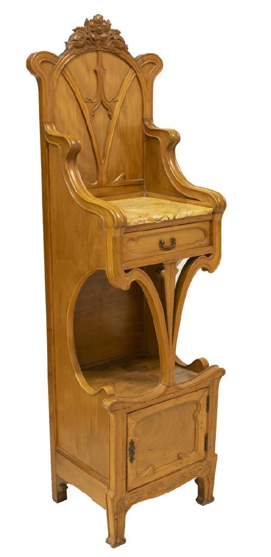 FRENCH ART NOUVEAU PERIOD BEDSIDE TABLE/ STAND: French Art Nouveau fruitwood bedside table/ stand, late 19th/ early 20th c., in the style of Louis Majorelle (France, 1859-1926), having raised back with expressive floral carving and sinuous whiplash