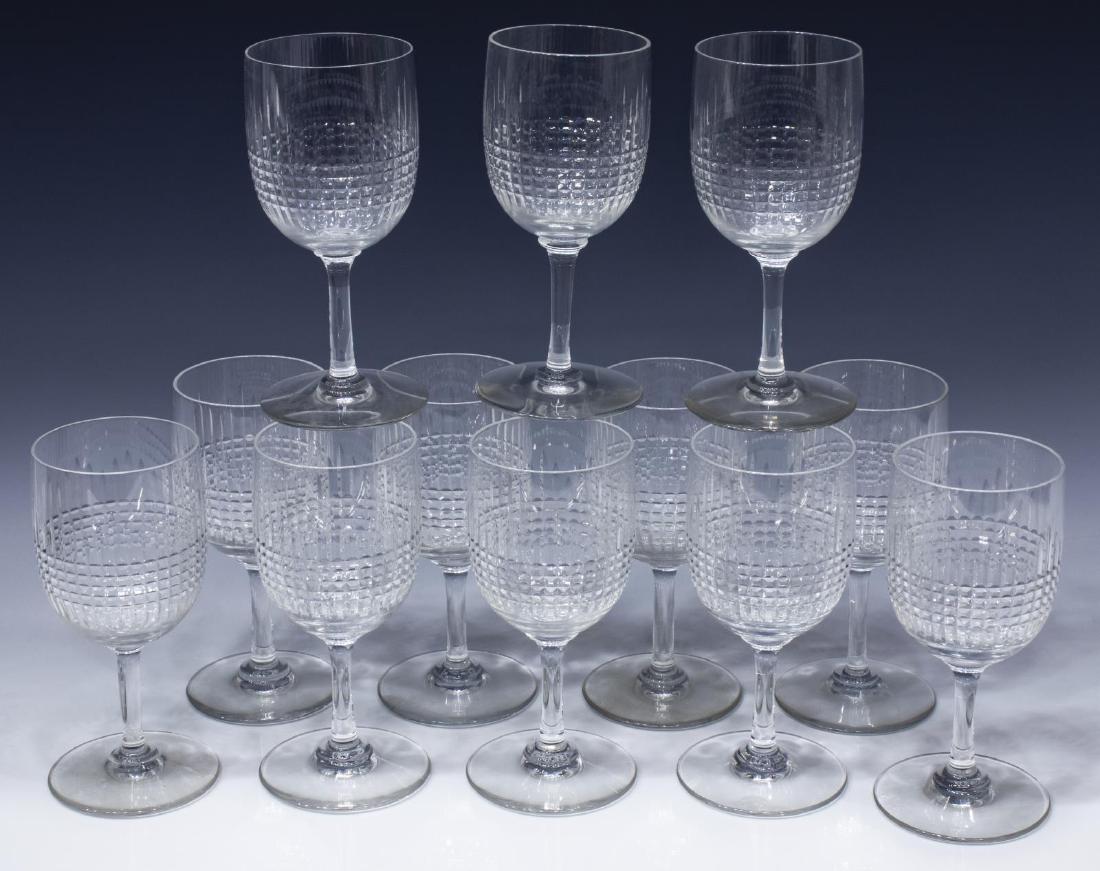 (12) BACCARAT 'NANCY' CRYSTAL CLARET WINE STEMS: (lot of 12) French Baccarat "Nancy" crystal claret wine stems, (one) with rim chip, approx 5.5"h; 3.5lbs total Start Price: $200.00