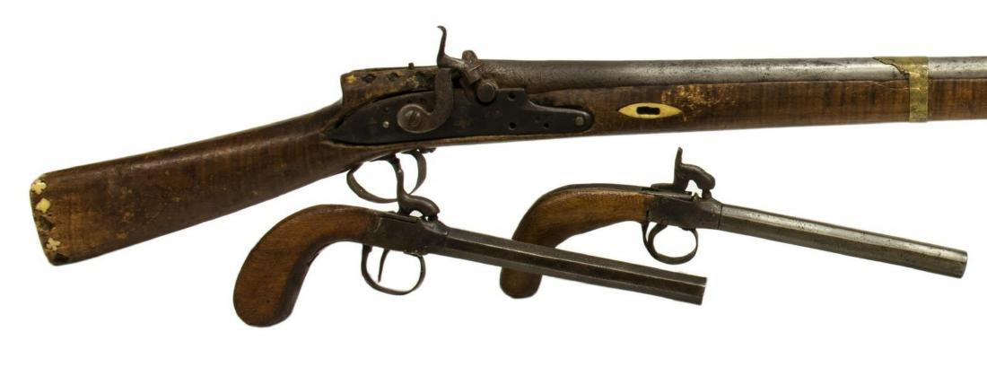 (3) ANTIQUE BOOT PISTOLS & CAMEL PERCUSSION GUN: (lot of 3) Antique firearms: (2) percussion boot pistols, each with 6.25" octagonal barrel, wood grips, one with strong action, minimal engraving at receiver and marked 11, the other unmarked, non ope