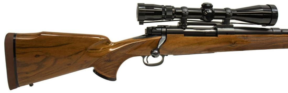 WINCHESTER MOD. 70 RIFLE .264 WIN MAG, NIKON SCOPE: Winchester Model 70 rifle, ..264 Win. Magnum caliber, bolt action, 26" barrel, checkered stock with cheekpiece, recoil pad, mounted Nikon 3x9 scope, SN 550XXX *REQUIRES FFL TRANSFER* Start Price: $300
