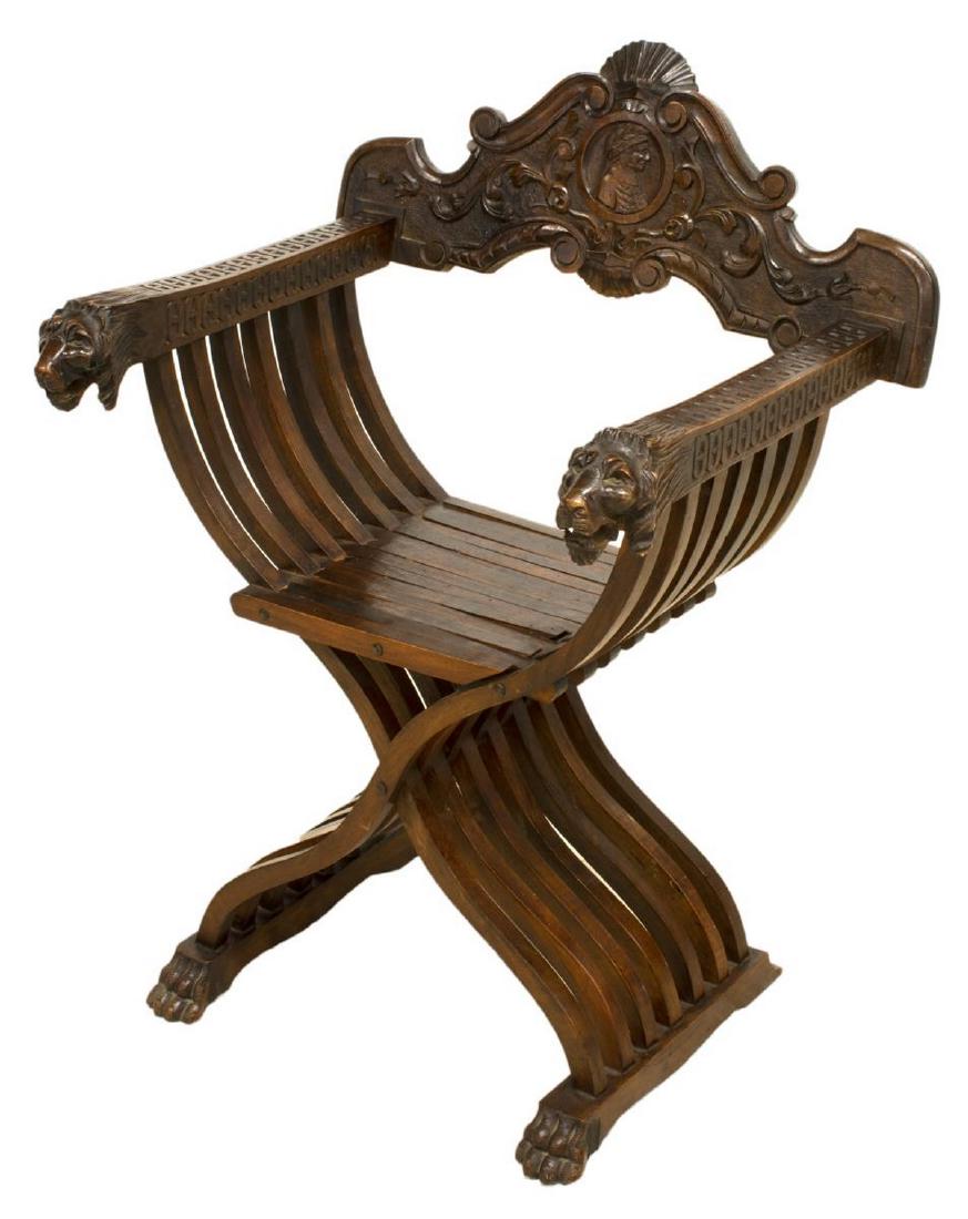 ITALIAN CARVED WALNUT SAVONAROLA CHAIR: Italian walnut Savonarola chair, 19th c., the removable backrest carved with figure in profile, scrollwork and foliate elements, running ornamentation to the arms ending in lion head handholds, curule