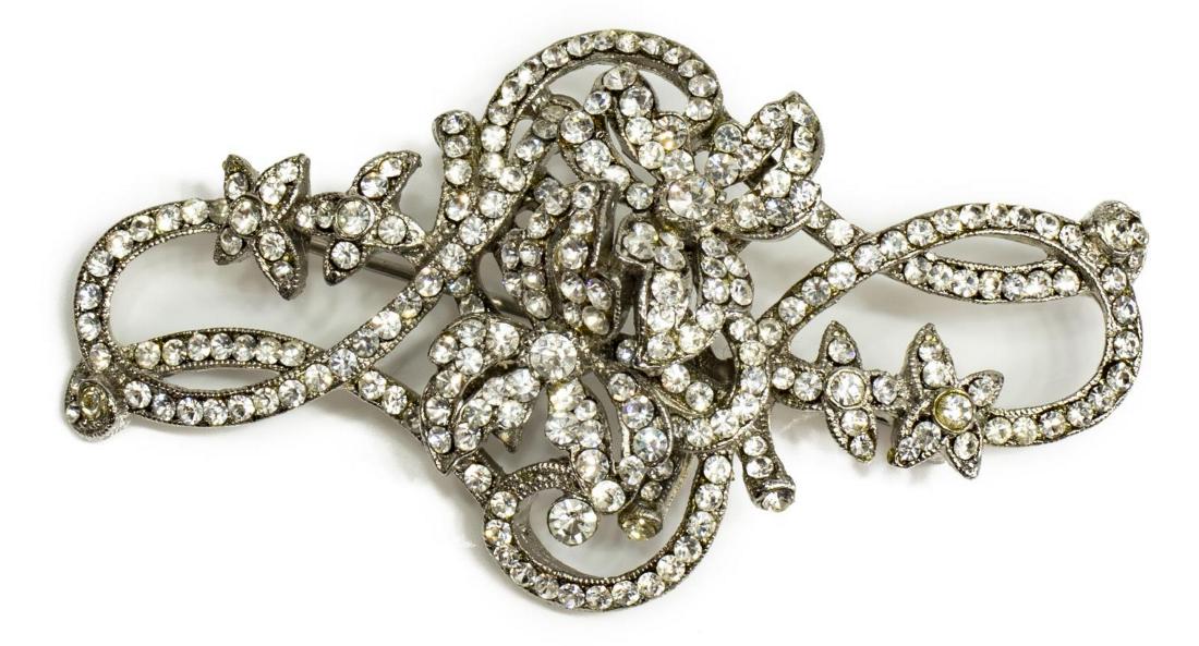 VINTAGE JOSE & MARIA BARRERA RHINESTONE BROOCH PIN: Ladies Jose and Maria Barrera brooch/ pin, silver-tone metal, with clear crystal rhinestones, marked at reverse, approx 1.5"h, 3"w, for shipping purposes only: 20.5 grams Start Price: $80.00