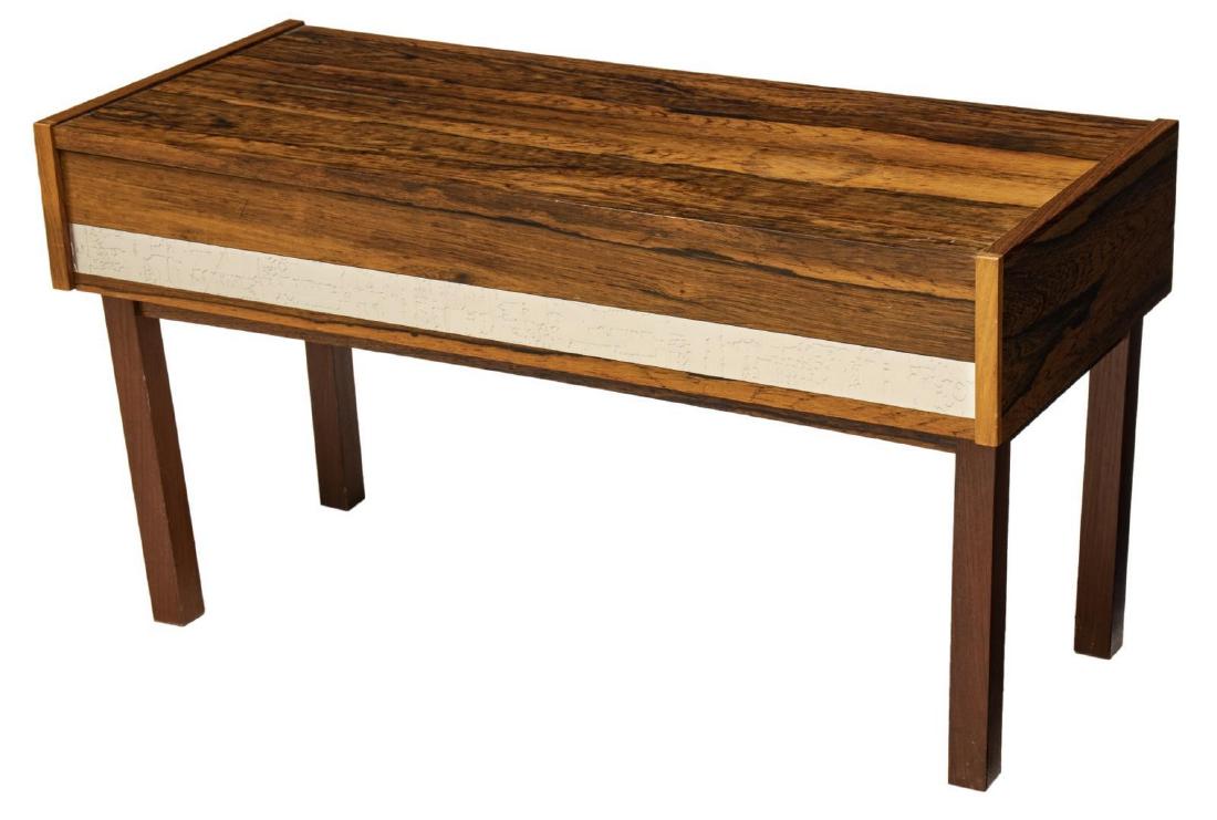 DANISH MID-CENTURY MODERN ROSEWOOD LOW TABLE: Danish mid-century modern rosewood low table, c. 1960s, designed by J. Holmer-Hansen for Risskov Spejle, fitted with a single drawer, drawer front with embossed silver-tone metal plaque, rising on blo