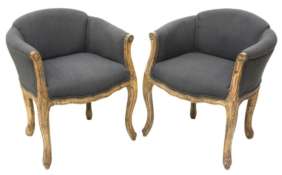 (PR)NEW DUPUIS FURNITURE 'RAMLA' BERGERE ARMCHAIR: (pair) New Dupuis Furniture "Ramla" bergere armchairs, having blue upholstery with a wood frame, rising on cabriole legs, resting on whorl feet to front, approx 28.75"h, 22.75"w, 20"d *Provenance: Inv