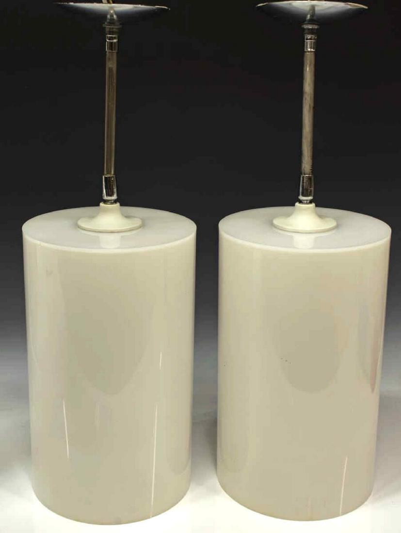 (2) MODERNIST HABITAT WHITE ACRYLIC PENDANT LIGHTS: (pair) Modernist hanging pendant lights, c. 1970s, attributed to Paul Mayen (Spain, United States, 1918-2000) for Habitat, having white acrylic cylindrical shade, concealing a single light, with chrom