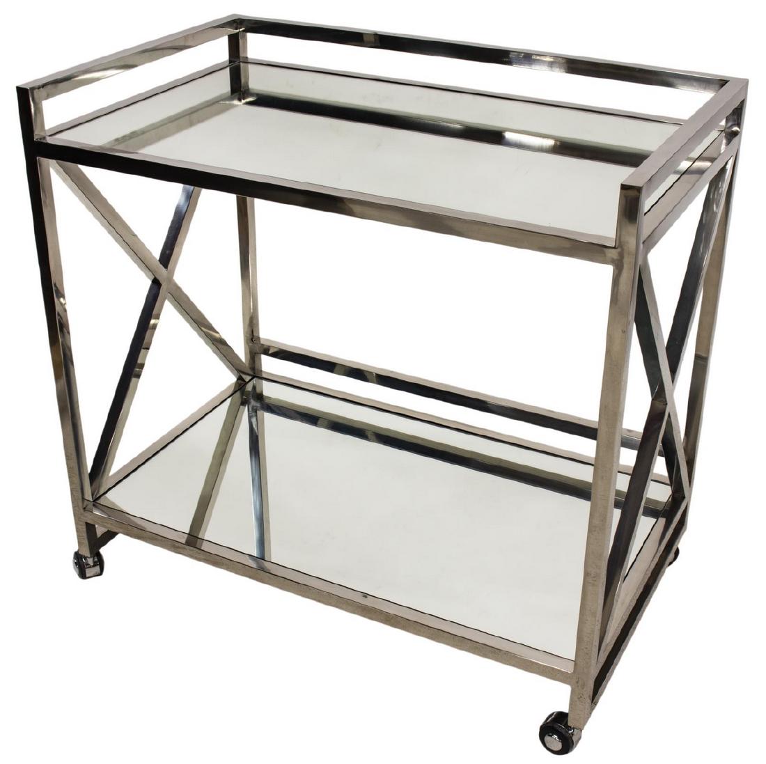 MODERN CHROMED METAL MIRROR SHELF SERVICE CART: Modern chromed metal service cart, late 20th c., the chromed metal body supporting two flat plate mirror shelves, the top shelf with open rail wrapping around three sides, the lower with open rail to