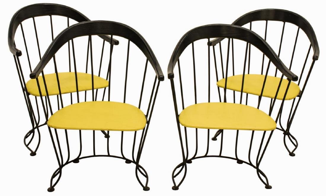 (4) MODERNIST BARREL BACK WOOD & IRON CHAIRS: (lot of 4) Modernist barrel back chairs, c. 1970, bentwood toprail in ebonized finish, over black iron frame, citron faux leather covered seats, rising on glider feet, approx 30.75"h, 24.25"w, 18"d St