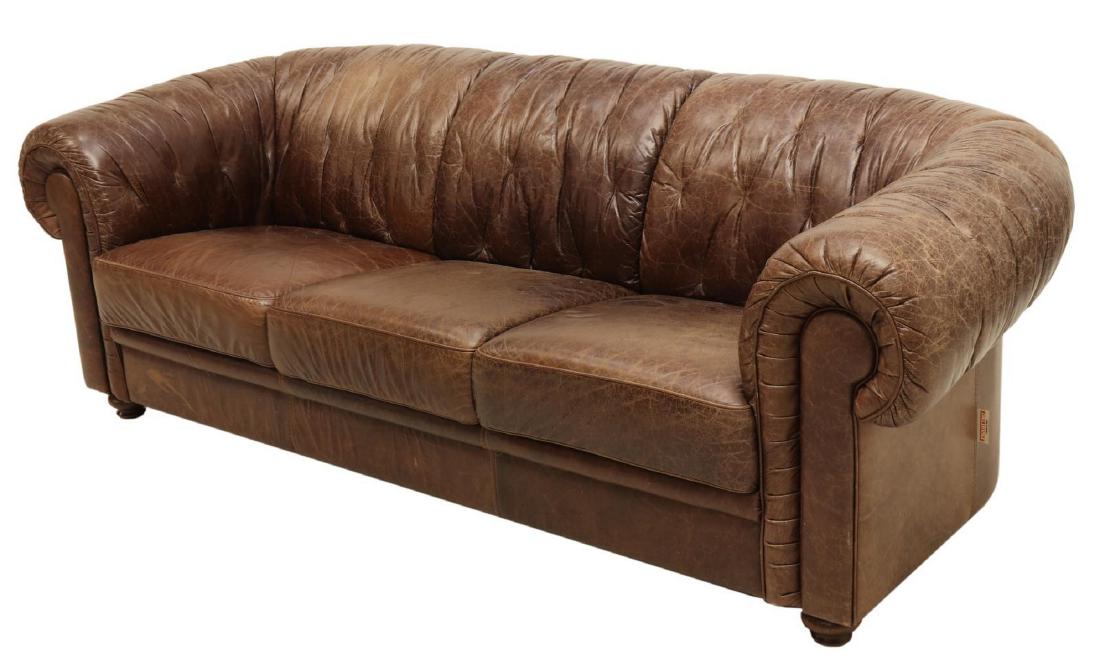 ITALIAN PIQUATTRO LEATHER CHESTERFIELD CLUB SOFA: Italian leather three-seat chesterfield sofa, late 20th c., manufactured by Piquattro, accented by pleating, rising on front wood bun feet, creasing and cracking to leather, approx 30.5"h, 87"w, 36"d 