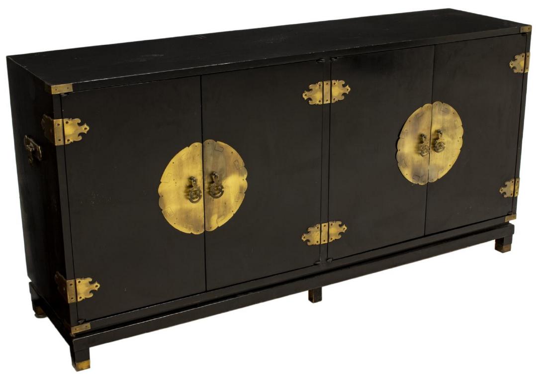 PERMACRAFT ASIAN STYLE EBONIZED WOOD SIDEBOARD: Asian style ebonized wood sideboard, 20th c., manufactured by Permacraft, Sanford Furniture Company, having gilt metal hardware, with dual double door cabinets, the left opening to interior with singl