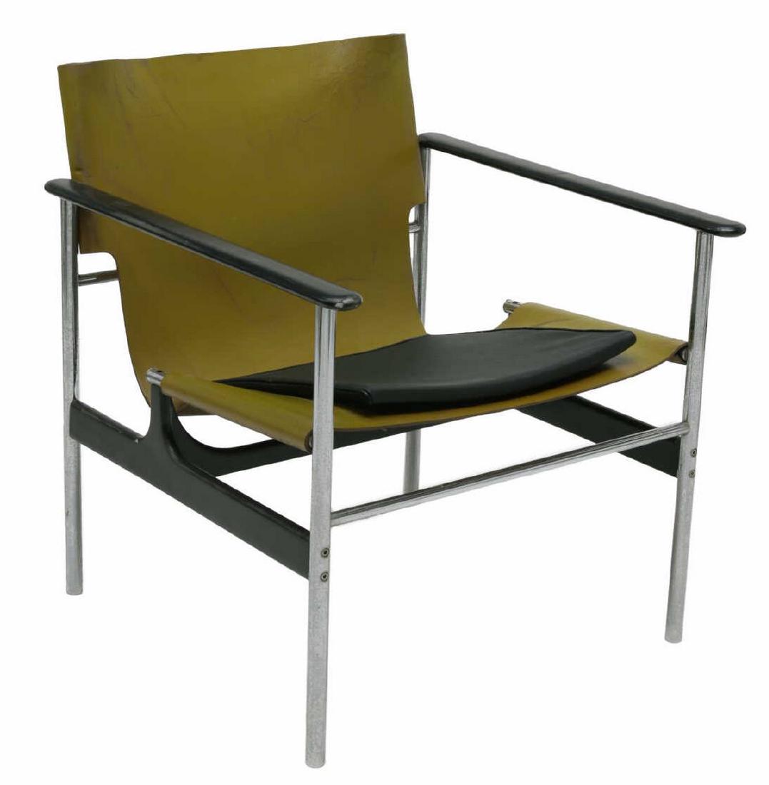 POLLOCK KNOLL ASSOCIATES MODEL 657 SLING ARMCHAIR: Model 657 armchair, designed by Charles Pollock (United States, 1930-2013) for Knoll Associates, tubular chrome steel frame, cast aluminum arms and stretcher in black finish, saddle leather sling seat