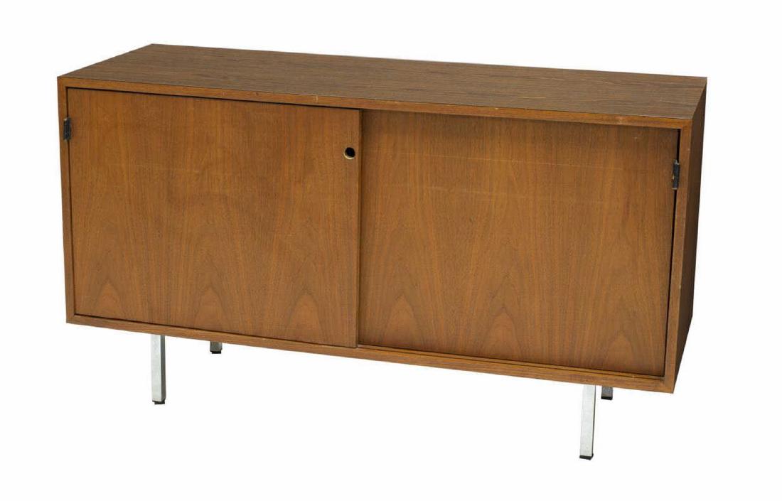 FLORENCE KNOLL (D.2019) MID-CENTURY FILE CREDENZA: Mid-century modern credenza, c. 1960s, attributed to Florence Knoll (United States, 1917-2019) for Knoll Associates, rectangular case in walnut finish, dual sliding doors with leather tab pulls, openi