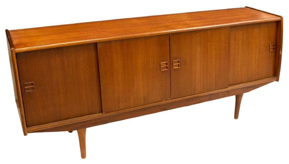 DANISH MID-CENTURY MODERN TEAK LOW SIDEBOARD: Danish mid-century modern teak sideboard, c. 1950s, long rectangular case, fitted with sliding doors, opening to interior shelves, left side with mirror-backed bar and two shallow flatware drawers, ri