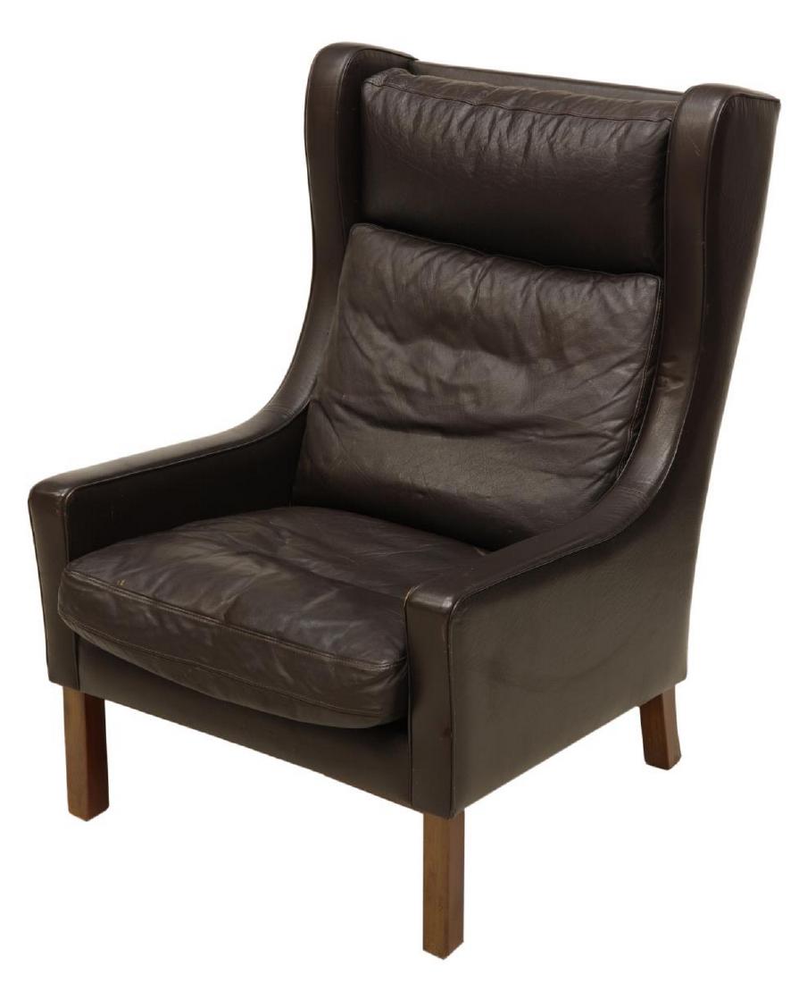 DANISH MID-CENTURY LEATHER WINGBACK ARMCHAIR: Danish mid-century modern leather wingback armchair, c. 1960s-1970s, manufactured by Vemb Polster Mobelfabrik, having removable cushions, rising on rectangular legs, retaining manufacturer's tag, crea