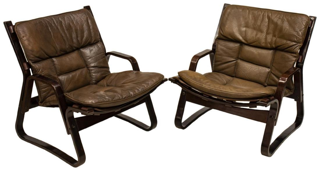 (2) SCANDINAVIAN MODERN SIESTA STYLE LOUNGE CHAIRS: (lot of 2) Scandinavian modern Siesta style lounge chairs, c. 1960s-1970s, in the manner of Ingmar Relling (Norway, 1920-2002), bentwood frames, sling back and seat secured with leather straps, remova