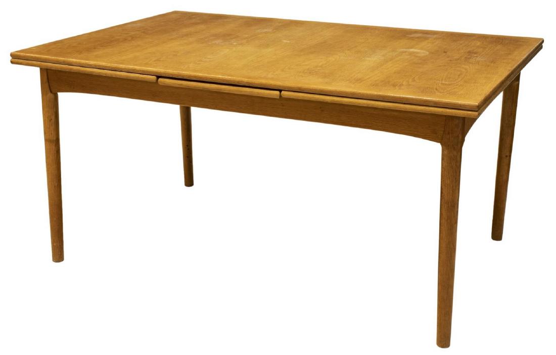 DANISH MID-CENTURY DRAWLEAF EXTENSION DINING TABLE: Danish mid-century modern draw leaf dining table, c. 1950s, rectangular top with draw leaves, rising on tapered legs, tonal variation to draw leaves, approx 29.25"h, 59"w, 39.25"d, extended: 102.25"w