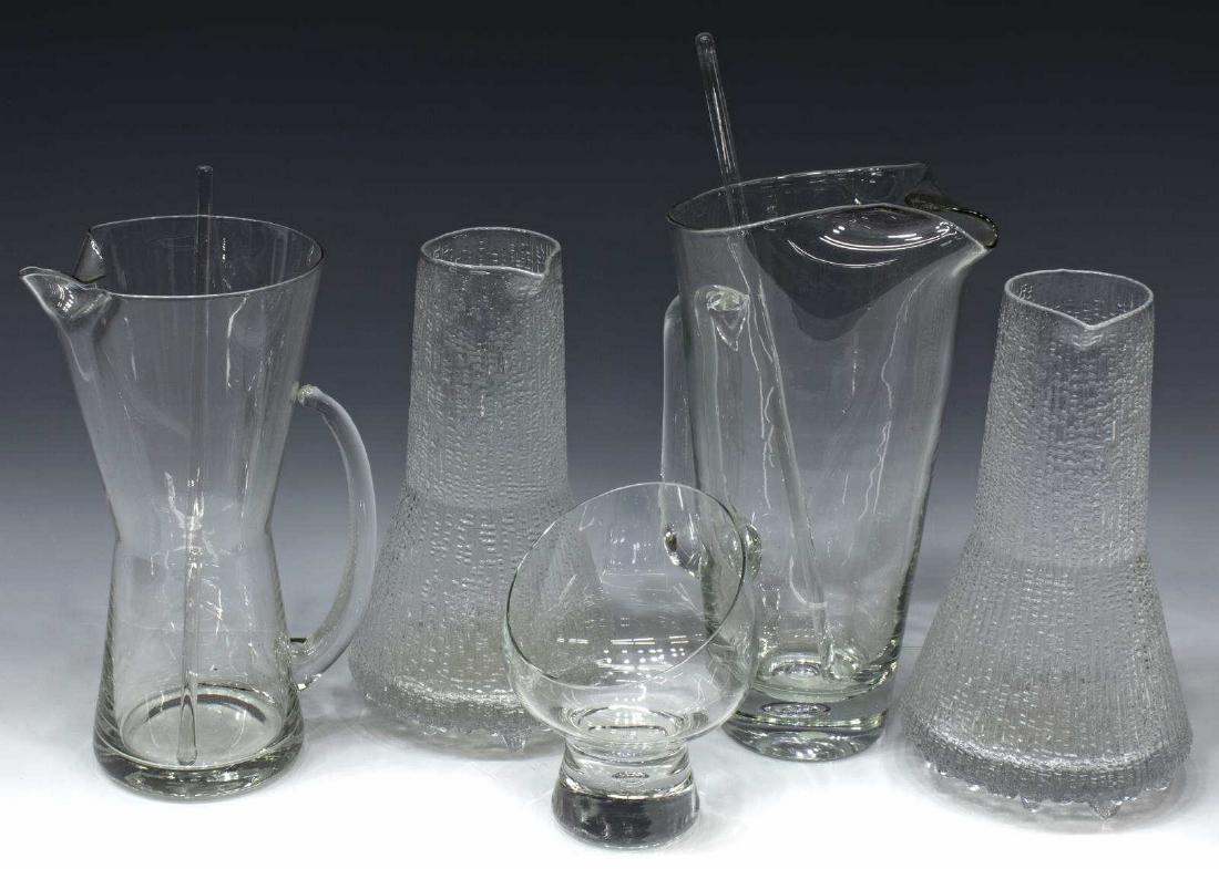 (5) MID-CENTURY GLASS BARWARE, IITTALA, HOLMEGAARD: (lot of 5) Mid-century modern glass bar and tableware, including: (2) Iittala "Ultima Thule" pitchers, designed by Tapio Wirkkala (Finland, 1915-1985), approx 9"h, 5"diam, (1) Holmegaard "Princess" co