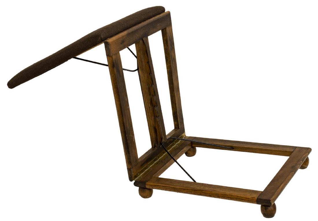 VINTAGE ERGONOMIC KNEELING CHAIR STOOL: Vintage ergonomic kneeling chair/ stool, retaining tag for Damart Sante Roubaix, upholstered seat, adjustable height and angle, on wood base with ball feet, closed: approx 5"h, 17.75"w, 14.25"d, talle