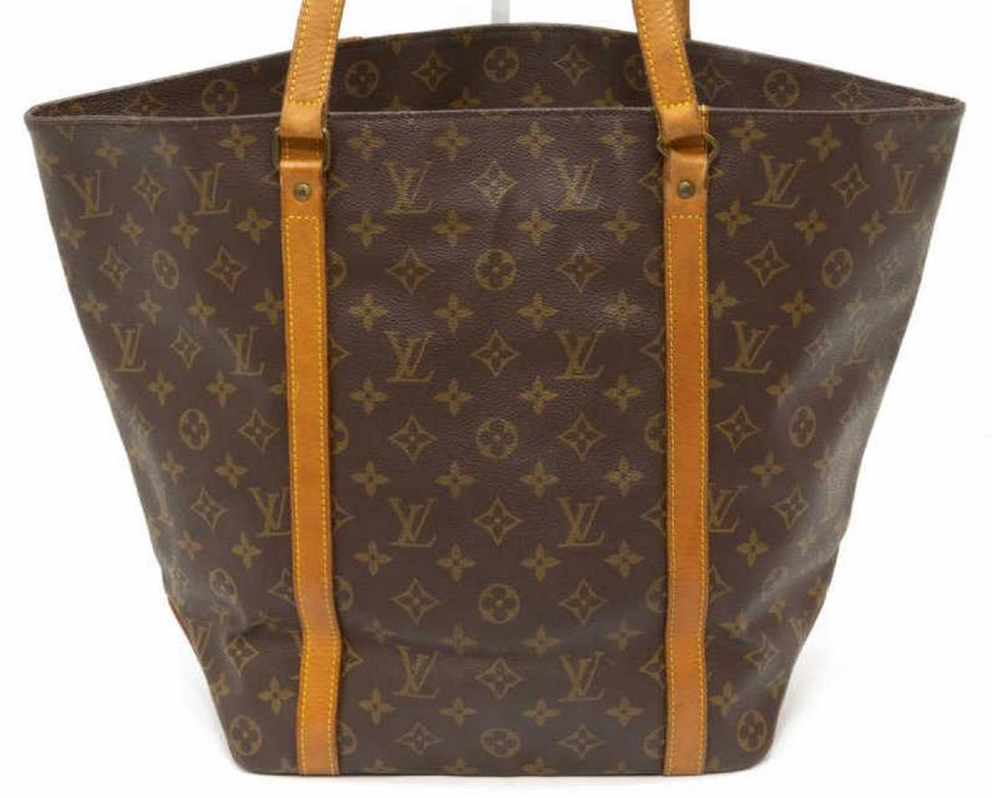 LOUIS VUITTON â€˜SAC SHOPPINGâ€™ MONOGRAM TOTE BAG: Louis Vuitton "Sac Shopping" tote bag, in brown and tan monogram coated canvas, with brass hardware, tan vachetta leather trim, dual flat handles, open top with brown coated canvas lined interior havi