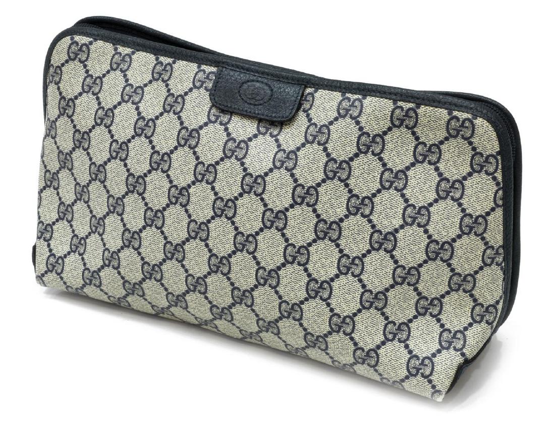 GUCCI NAVY & CREAM MONOGRAM COATED CANVAS CLUTCH (1 of 4)