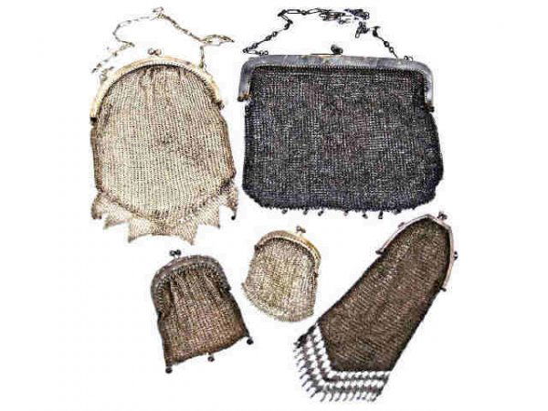 GROUP OF ANTIQUE MESH PURSES: (lot of 5) Group of five antique mesh purses to include: 2 small coin bags, one with three beaded drops, 4"(largest); unusual long bag with fancy mesh fringe, on a shaped frame, 7"l; large mesh bag wi