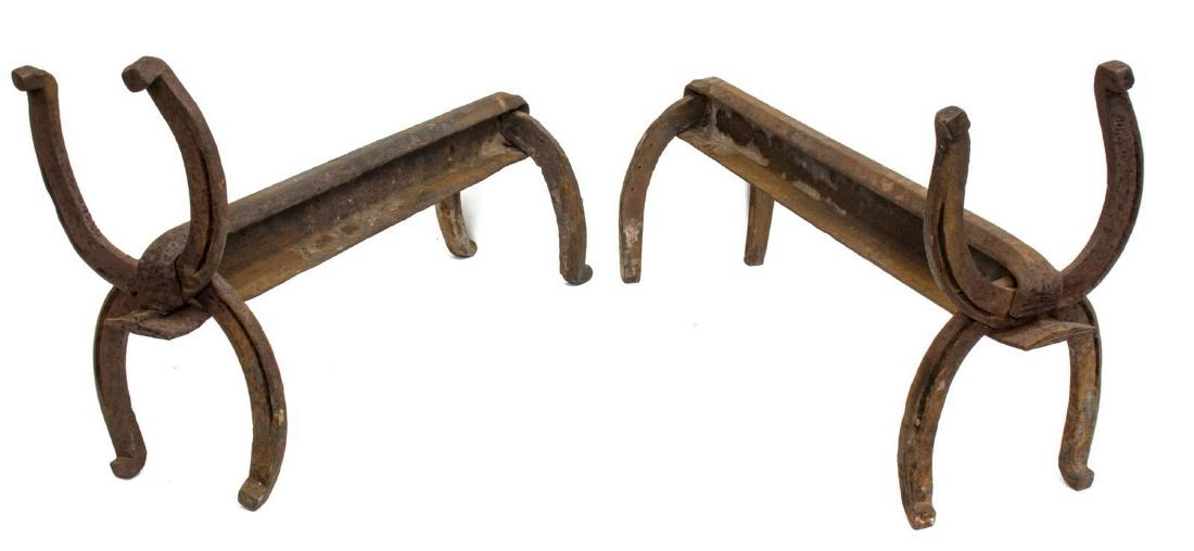 (2) TEXAS HORSESHOE & RAILROAD TIE ANDRIONS: (pair) Western iron firedogs/ andirons, early 20th c., Pecos, Texas, fashioned from horseshoes and railroad ties, oxidation, approx 14"h, 23.5"w, 7.5"d; 35lbs total Start Price: $80.00
