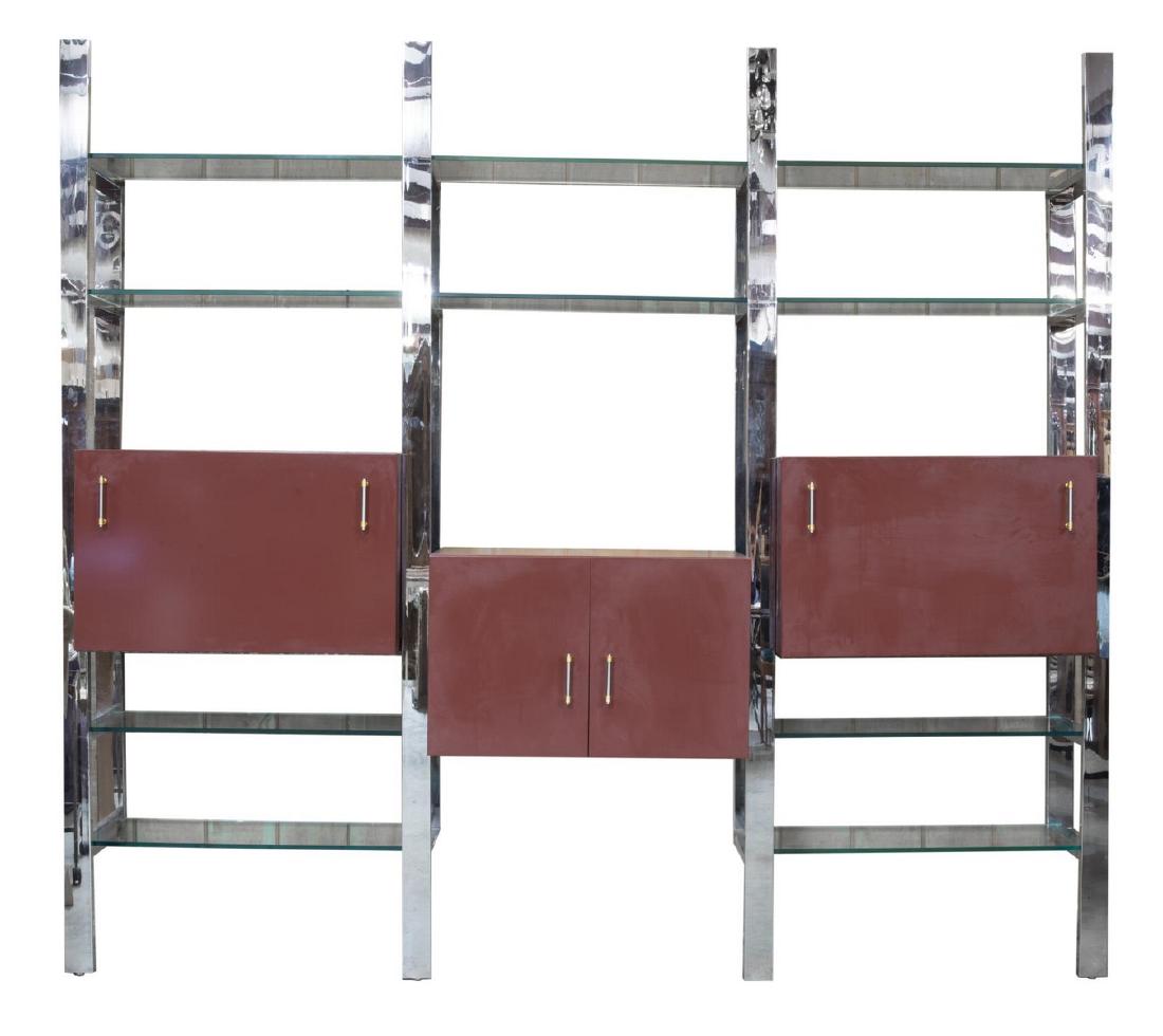 MODERNIST MODULAR WALL UNIT BOOKCASE: Modernist modular wall unit, c. 1970s, four chromed metal vertical supports, with glass shelves, three cases in maroon lacquered finish, center double-door cabinet, flanked by drop front cabinets, lef