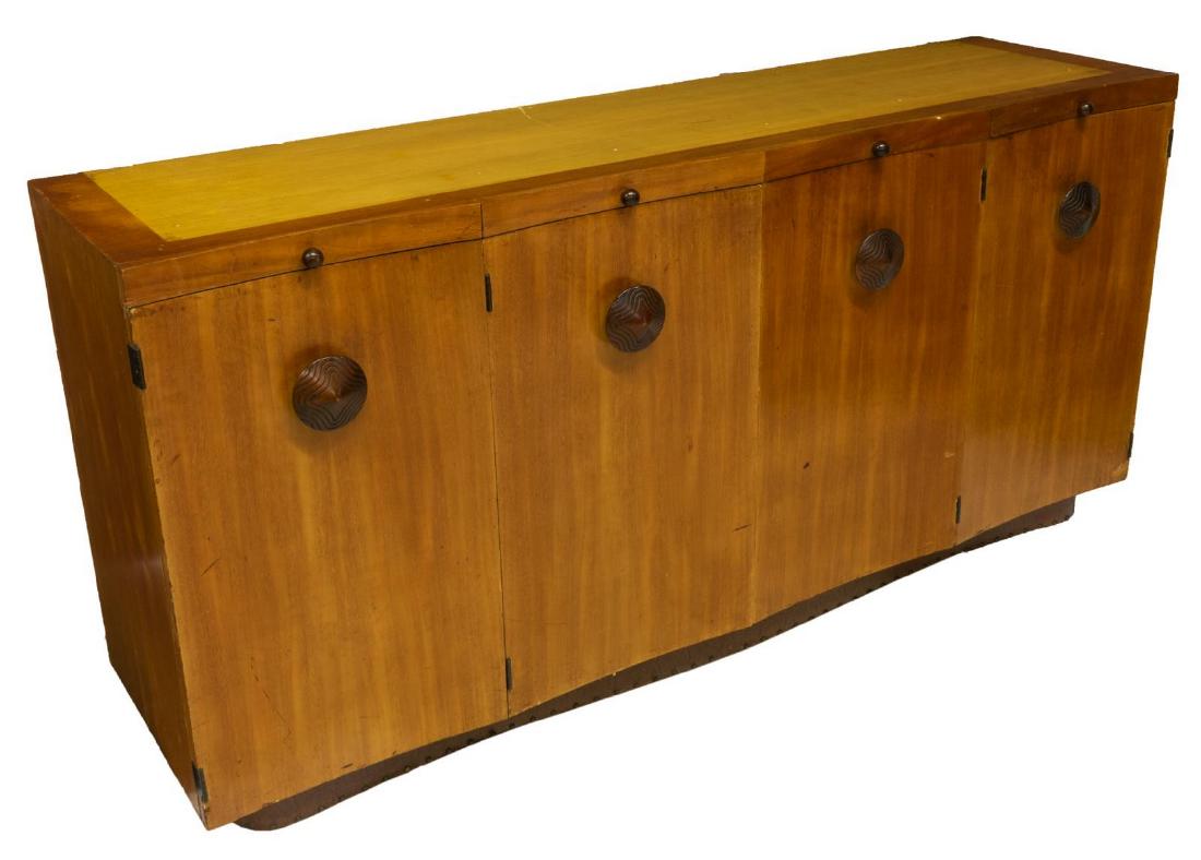 GILBERT ROHDE HERMAN MILLER PALDAO BUFFET BASE: Mid-century modern "Paldao" buffet/ sideboard base, designed by Gilbert Rohde (New York, 1894-1944) for Herman Miller, rectangular case with two frieze pull out trays flanking a pull out carving board