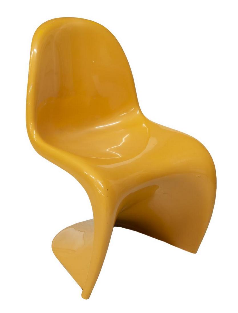 VERNER PANTON HERMAN MILLER MOLDED STACKING CHAIR: Modernist stacking chair, c. 1974, designed by Verner Panton (Denmark, 1926-1998) for Herman Miller, in molded yellow plastic, Herman Miller mark to underside of seat, approx 33.25"h, 20"w, 21"d Start