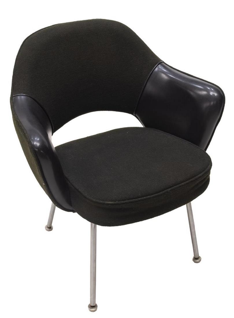 EERO SAARINEN FOR KNOLL EXECUTIVE ARMCHAIR: Saarinen Executive armchair, designed by Eero Saarinen (Finland, United States, 1910-1961) for Knoll International Inc., in black woven upholstery, with tonal vinyl accents, rising on tubular chromed 