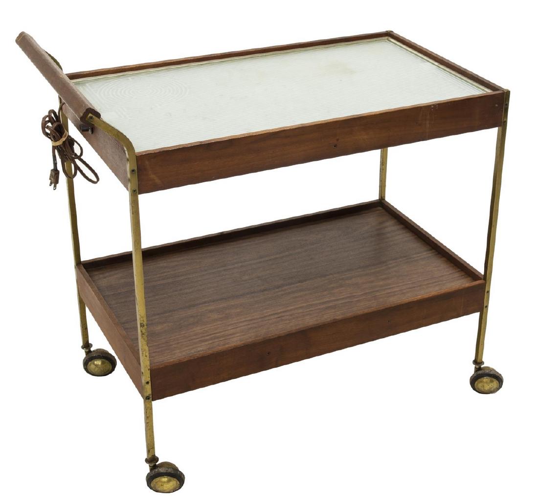 MID-CENTURY SALTON 'HOTRAY' HOSTESS WARMING CART: Mid-century modern hostess service cart, c. 1960s, "Hotray" by Salton, warming tray top, over lower tier, on wheels, approx 31"h, 32.5"w, 17.25"d Start Price: $50.00