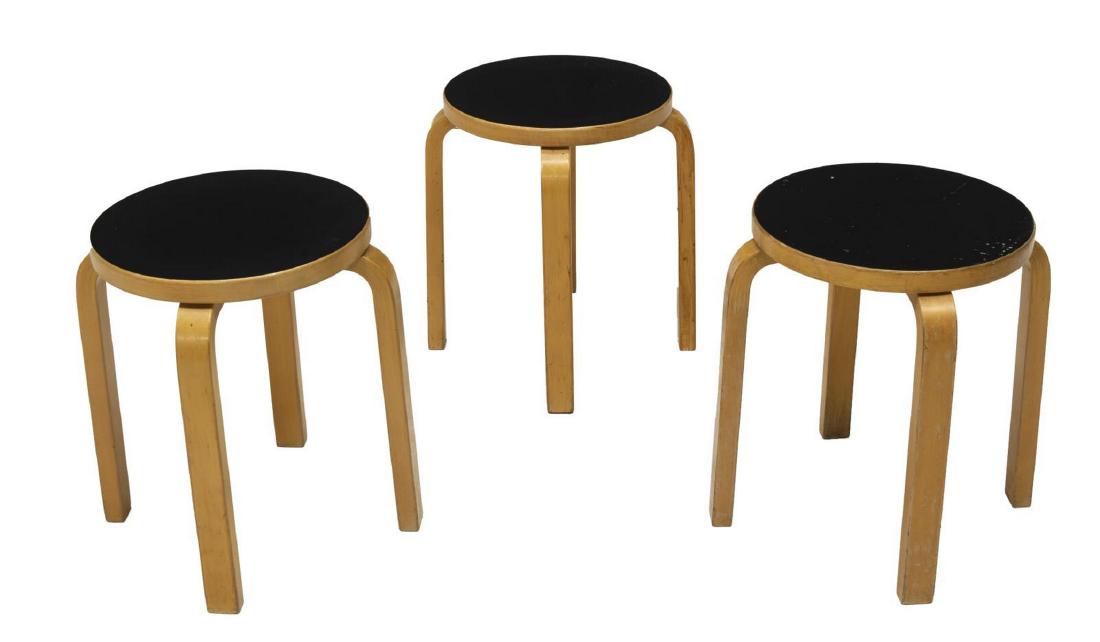 (3) ALVAR AALTO ICF MODEL 60 BIRCH STACKING STOOLS: (lot of 3) Model 60 stacking stools, designed by Alvar Aalto (Finland, 1898-1976) for ICF, circular black tops, laminated birch frames, on three bentwood legs, approx 17.25"h, 13.5"diam Start Price: $