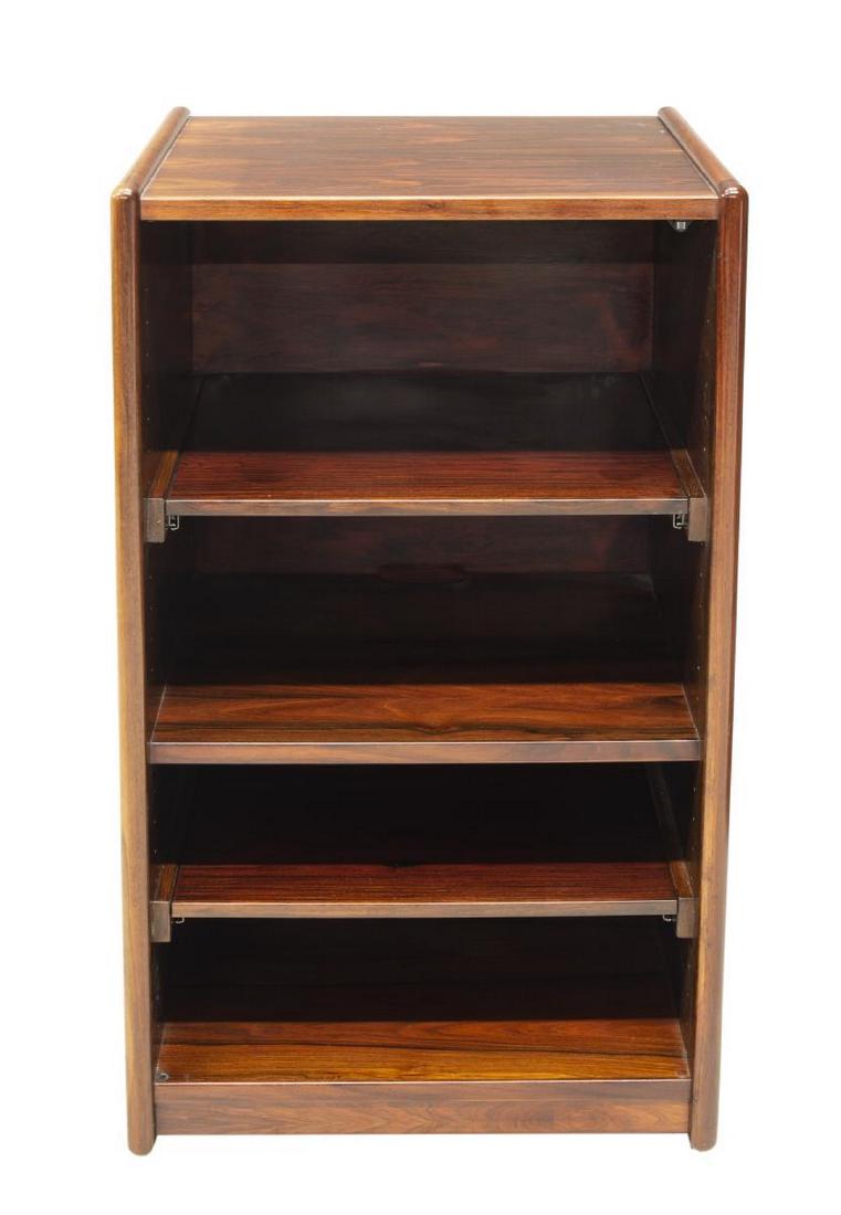 DANISH MODERN ROSEWOOD OPEN CABINET SHELVES: Danish modern rosewood open cabinet, late 20th c., narrow case with two fixed shelves and two pull out trays, on castors, approx 39.5"h, 24"w, 17.5"d Start Price: $150.00