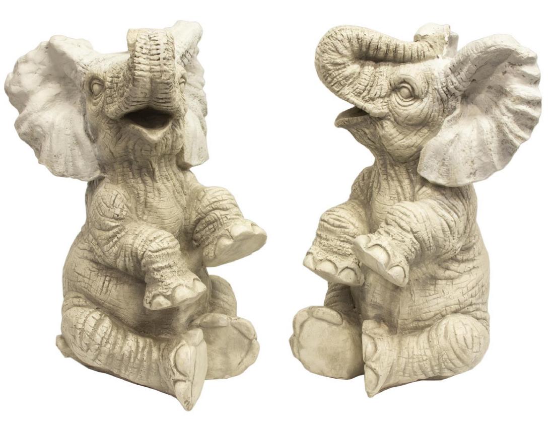 (2) CAST PLASTER ELEPHANT FIGURE W/ RAISED TRUNK: (lot of 2) Cast plaster figure, 20th c., modeled as an elephant with raised trunk, one with repair to ear, each approx 20.5"h, 12.5"w, 13"d; 40.5lbs total Start Price: $50.00