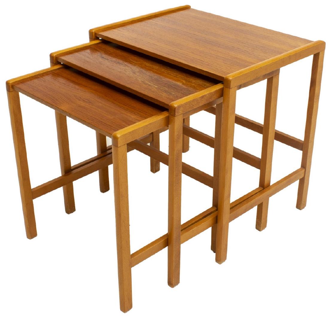 DANISH MID-CENTURY MODERN TEAK NEST OF 3 TABLES: Danish mid-century modern teak nesting tables, c. 1950s, graduated sizes, largest: approx 19.75"h, 19.25"w, 14.5"d Start Price: $100.00