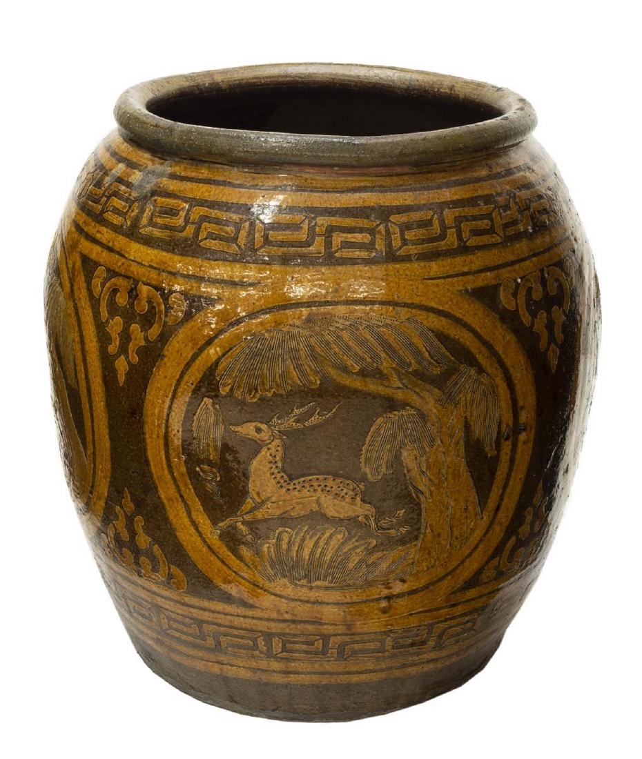 LARGE CHINESE EARTHENWARE PLANTER DEER: Large Chinese earthenware planter, 20th c., in ochre and brown glazes, rolled lip, Greek key band, reserves with deer and trees, approx 25.5"h Start Price: $80.00