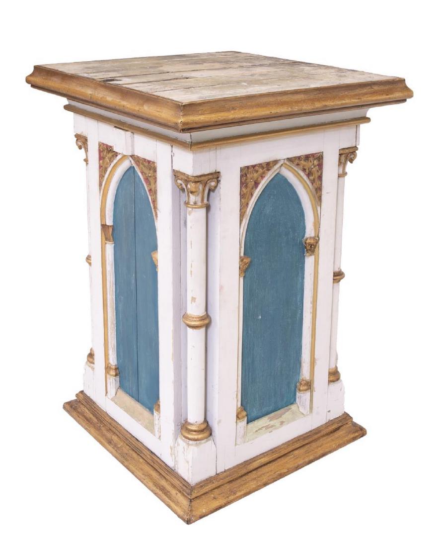 GOTHIC REVIVAL PARCEL GILT PAINTED STA ND: Gothic revival parcel gilt painted stand, late 19th c., having four polychrome panels with pointed arches and foliate carving, Corinthian style columns at corners, approx 49"h, 33.5"w, 33"d