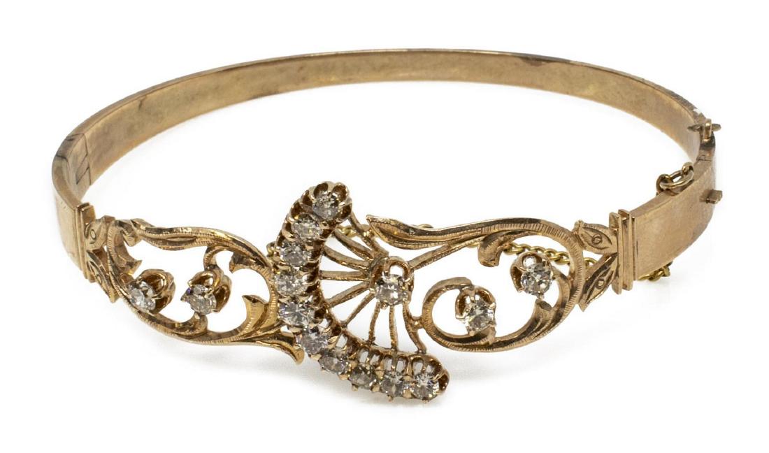 ESTATE 14KT ROSE GOLD & 1.33CTTW DIAMOND BRACELET: Estate 14kt rose gold (tested) and diamond bracelet, open work foliate frame set with (15) diamonds, approx 1.33cttw, slide closure with loose safety chain (lacking clasp), unmarked, interior: approx 
