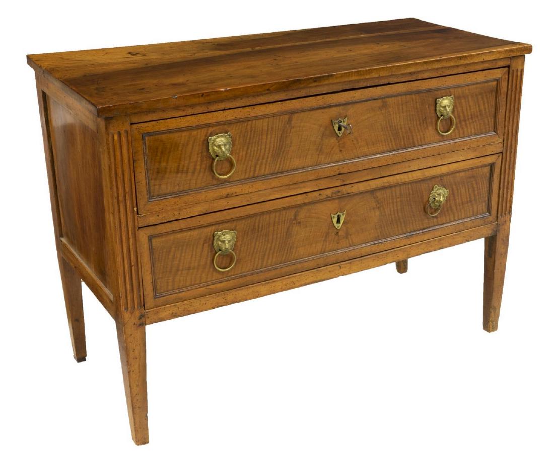 FRENCH LOUIS XVI STYLE FRUITWOOD COMMODE: French Louis XVI style fruitwood commode, 19th c., fitted with two drawers, shield form escutcheons and lion mask pulls with drop ring handles, on four tapered legs, restorations, approx 32.25"h, 43.7