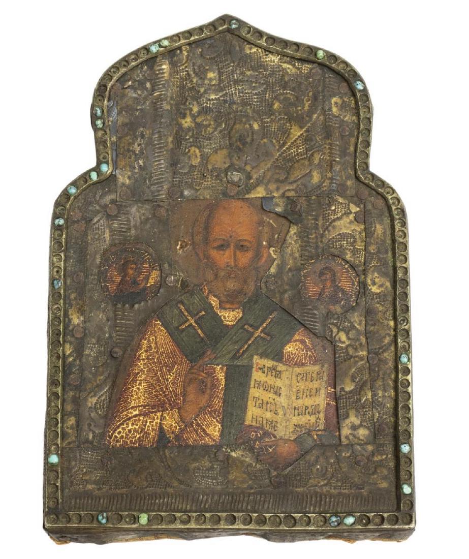 SMALL RUSSIAN ICON DEPICTING ST. NICHOLAS: Small Russian religious icon depicting St. Nicholas with depictions of Christ and The Virgin opposite the saints shoulders, the outer edge retaining only a few tiny turquoise cabochons, worn fabric at