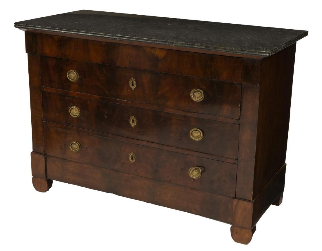 FRENCH EMPIRE STYLE MARBLE-TOP MAHOGANY COMMODE: French Empire style commode, 19th c., black marble top with beveled edge, over case with matched flame mahogany veneers, concealed frieze drawer, over three additional drawers, urn medallion ring pull