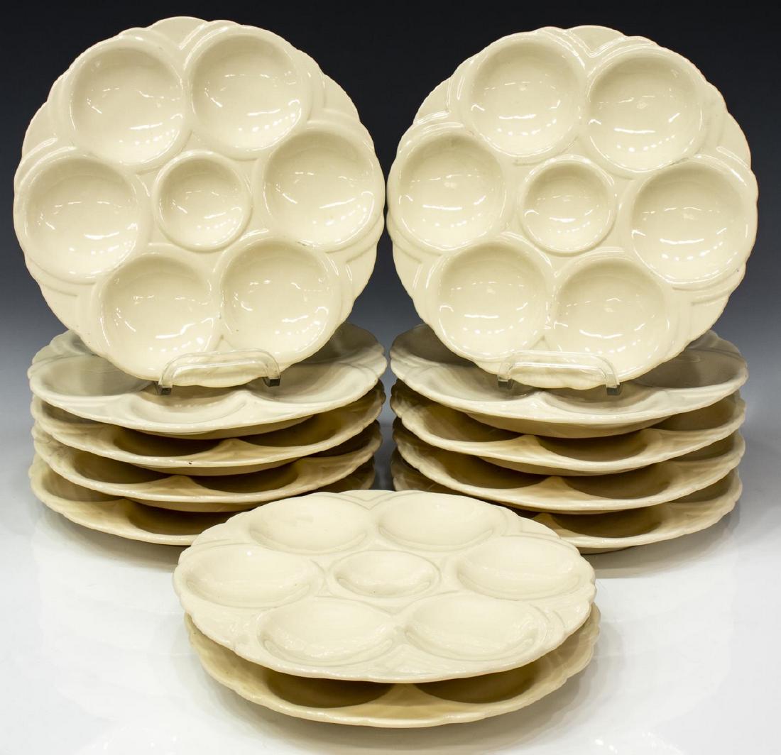 (12) FRENCH DIGOIN SARREGUEMINES OYSTER PLATES: (lot of 12) French faience oyster plates, 20th c., Digoin Sarreguemines, in a white glaze, marked as pictured, approx 9.25"diam; 17.25lbs total Start Price: $80.00