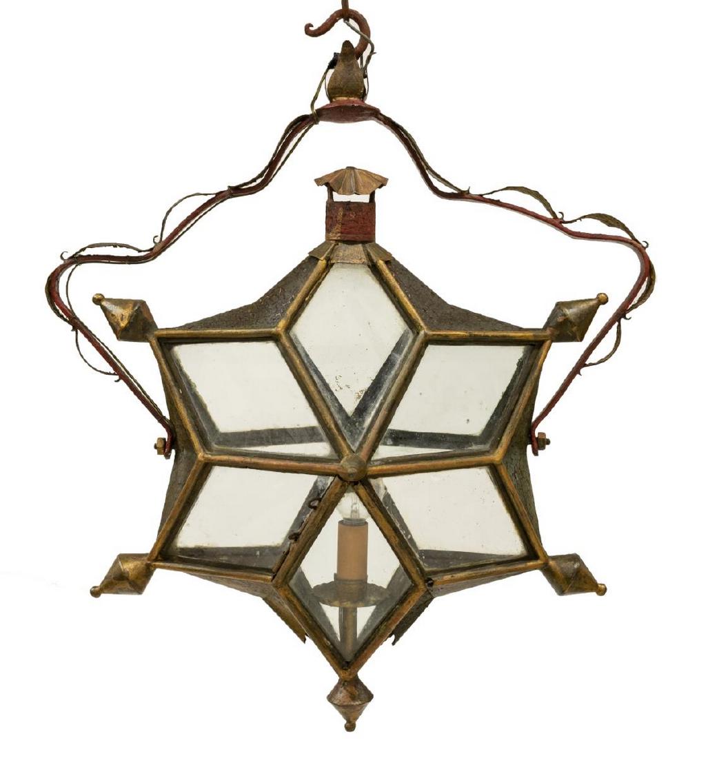 VENETIAN STAR LANTERN HANGING CEILING LIGHT: Venetian lantern ceiling light, 20th c., polychrome painted iron frame, top bracket with applied foliates, tilting star shaped lantern shade with segmented glass panes, centering a single light, in ne