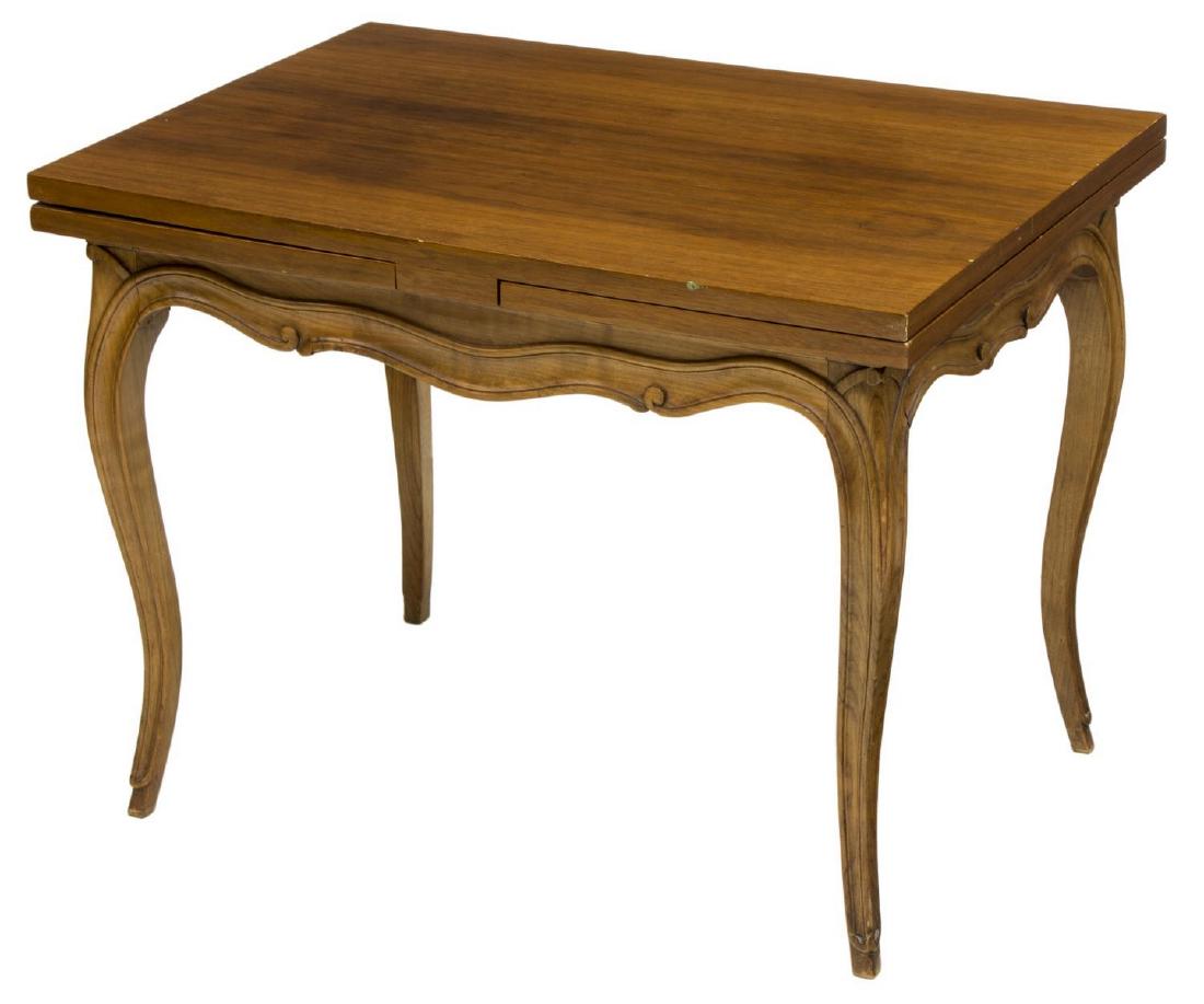 LOUIS XV STYLE WALNUT DRAW LEAF COFFEE TABLE: Louis XV style draw leaf coffee table, in walnut finish, having rectangular top, over scalloped carved frieze, rising on cabriole legs, with hoof feet, with leaves extended: approx 50.25"w; with leave