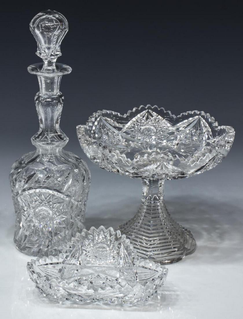 (3) AMERICAN BRILLIANT PERIOD CUT-GLASS TABLEWARE: (lot of 3) American Brilliant Period cut glass tableware, including: (1) ornate decanter with stopper, a paneled and notched neck over body with well defined leaves and hobstar panels to either side, 