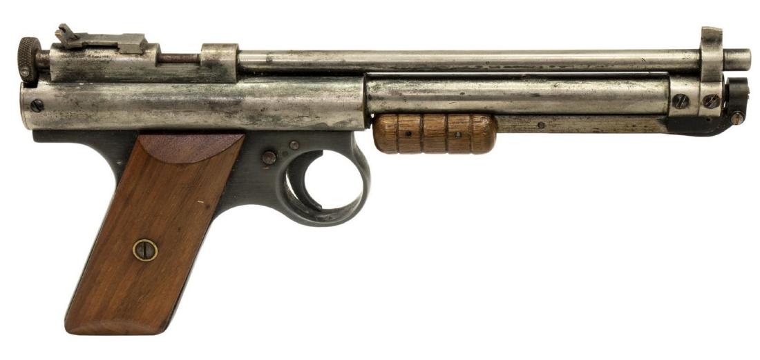 BENJAMIN FRANKLIN M117 AIR PELLET PISTOL, C. 1940: Benjamin Franklin Model 117 air pistol, c. 1940, pump and bolt action, rifled 7" barrel, wood grips, worn finish, holds air, seems to operate correctly, together with (1) holster, overall in holster: 