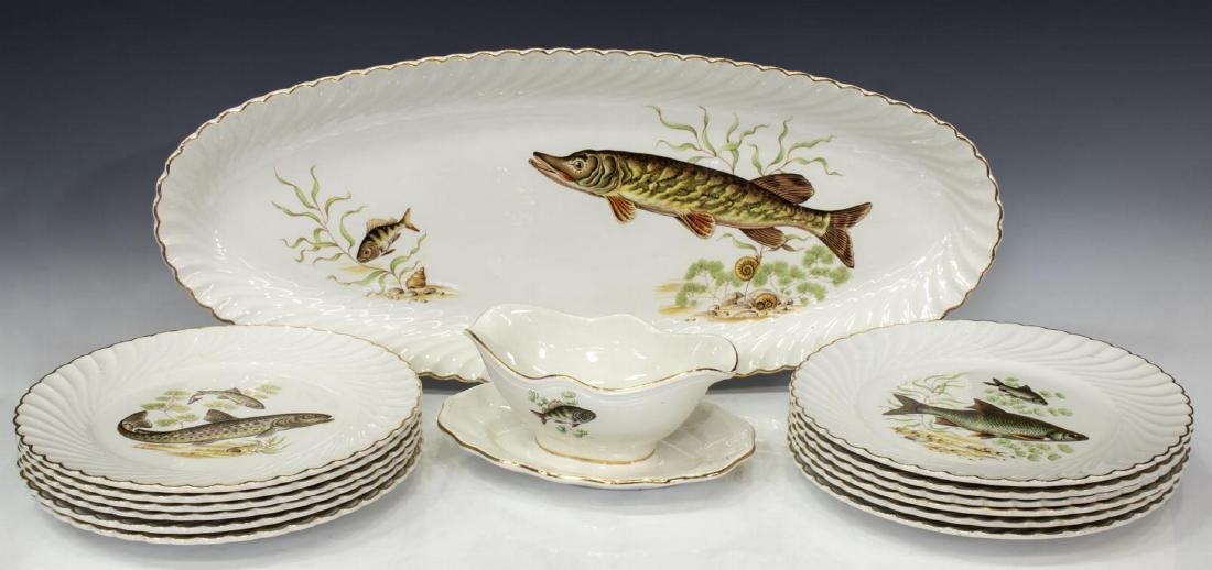 (14) FRENCH LUNEVILLE FISH SERVICE PLATES, PLATTER: (lot of 14) French Luneville fish service ceramic tableware, comprising: (1) serving platter, 9.5"l, 23.5"w, (12) dinner plates, 10"diam, (1) gravy/ sauce boat with attached underplate, unmarked, of a