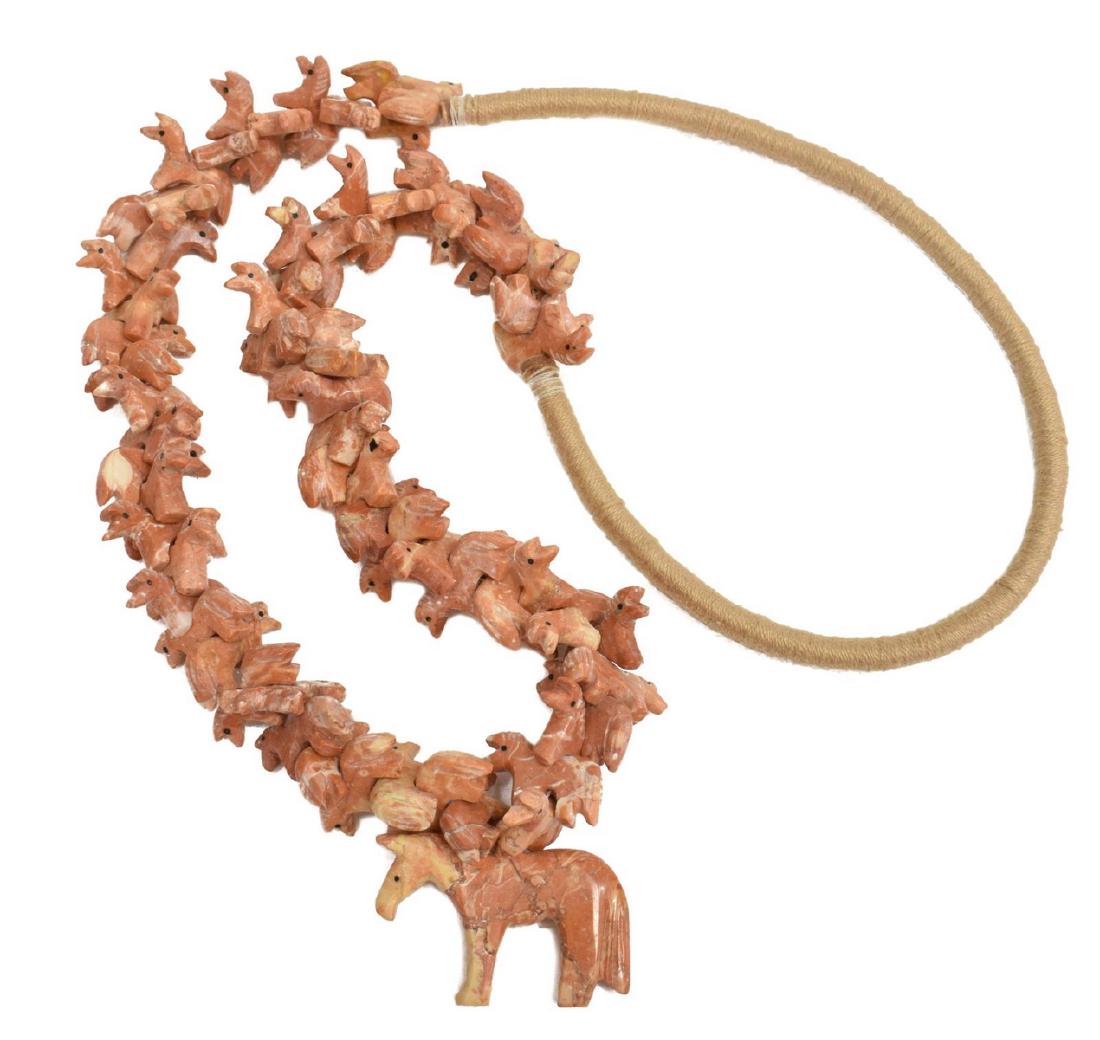 NATIVE AMERICAN CARVED STONE HORSE FETISH NECKLACE: Native American fetish necklace, likely Zuni, carved stone horses, central large horse pendant, with wrapped cord, approx 27.5"l (necklace only), pendant: 1"h, 1.75"l, 153 grams (inclusive of all mate
