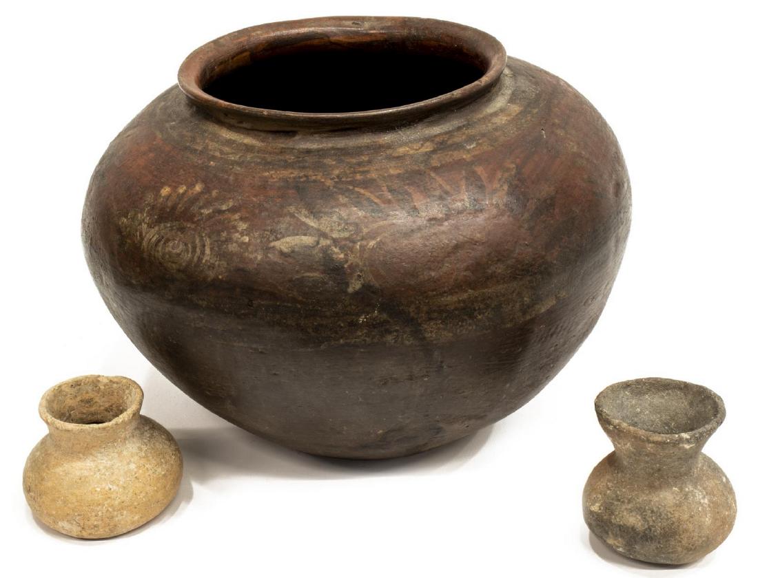 (3) EARTHENWARE POTTERY VESSELS, LIKELY MEXICO: (lot of 3) Earthenware vessels, likely Mexico, including (1) large pot with faint remnants of painted decoration, approx 8.25"h; (2) small jars, some chips, approx 3"h **Provenance: From the Estate of
