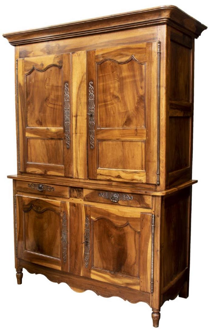 FRENCH PROVINCIAL FIGURED DEUX CORPS BUFFET: French Provincial figured deux corps buffet, 19th c., the cornice top over two cabinet doors opening to interior shelving, two drawers above two additional doors opening to interior shelving, scallope
